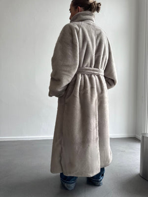 Cozy beige MEOTINE robe with a belted waist, featuring a high collar and oversized sleeves, perfect for chilly days.