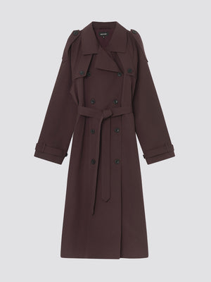 Stylish burgundy trench coat with a belted waist and double-breasted buttons, perfect for a chic look by MEOTINE.
