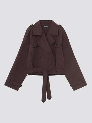 Stylish cropped trench coat in deep burgundy with double-breasted buttons and a belted waist, perfect for a chic look by MEOTINE.