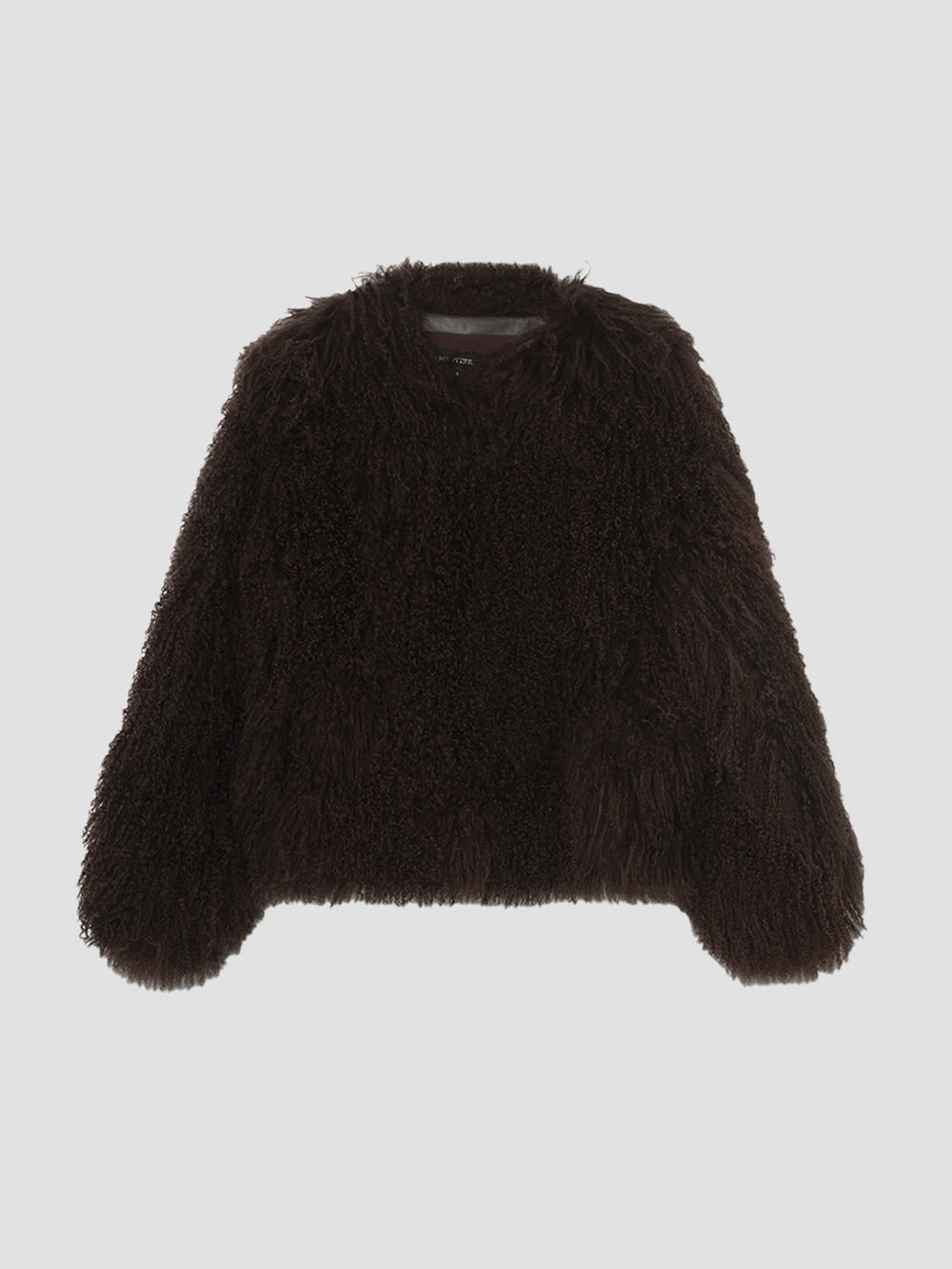 Cozy brown fluffy sweater with a relaxed fit, perfect for layering. Ideal for a stylish and warm look by MEOTINE.