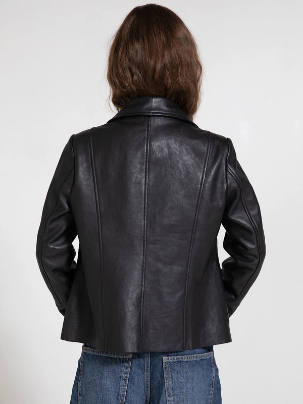 Stylish black leather jacket with a tailored fit, featuring a classic collar and back seam detailing, perfect for a chic look.
