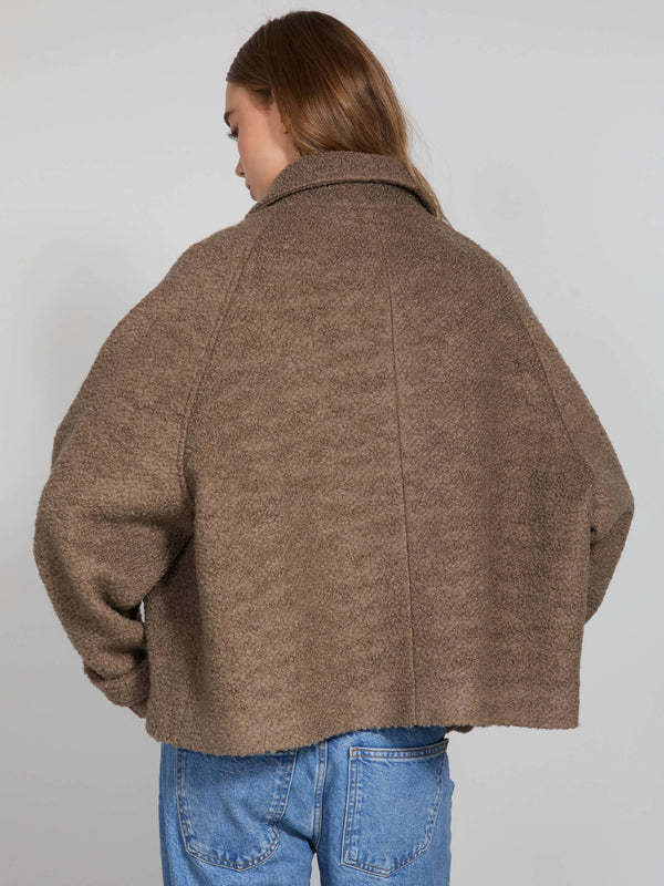 Cozy brown oversized jacket with a soft texture, perfect for layering. Ideal for casual outings, by MEOTINE.