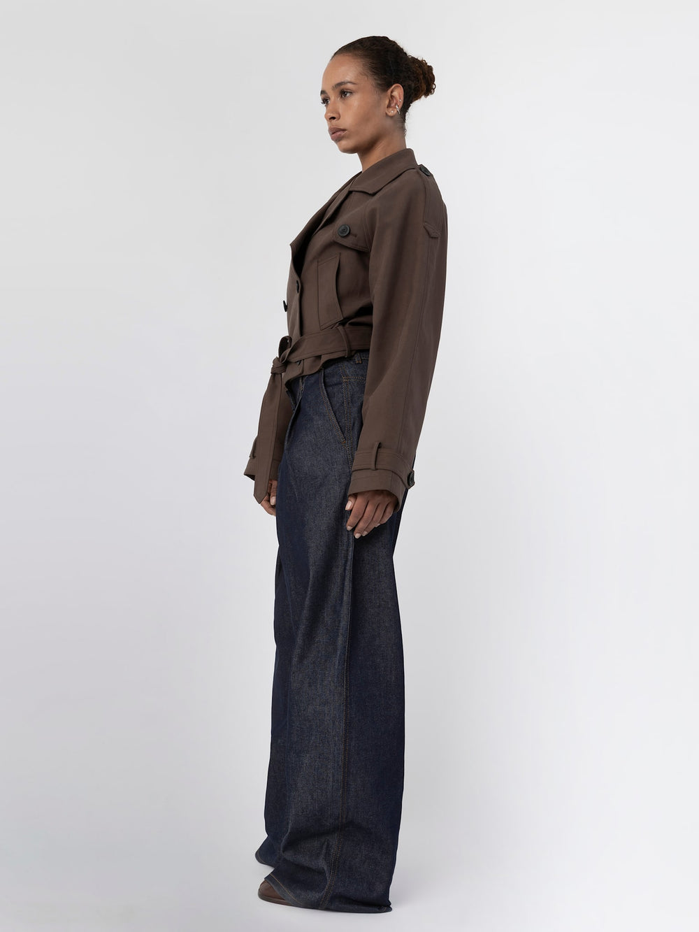 Stylish brown cropped trench coat with a belted waist, featuring double-breasted buttons, by MEOTINE. Perfect for a chic look.