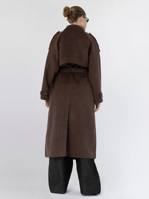 Stylish brown trench coat with a cropped design and long sleeves, paired with wide-leg pants, showcasing MEOTINE's modern aesthetic.