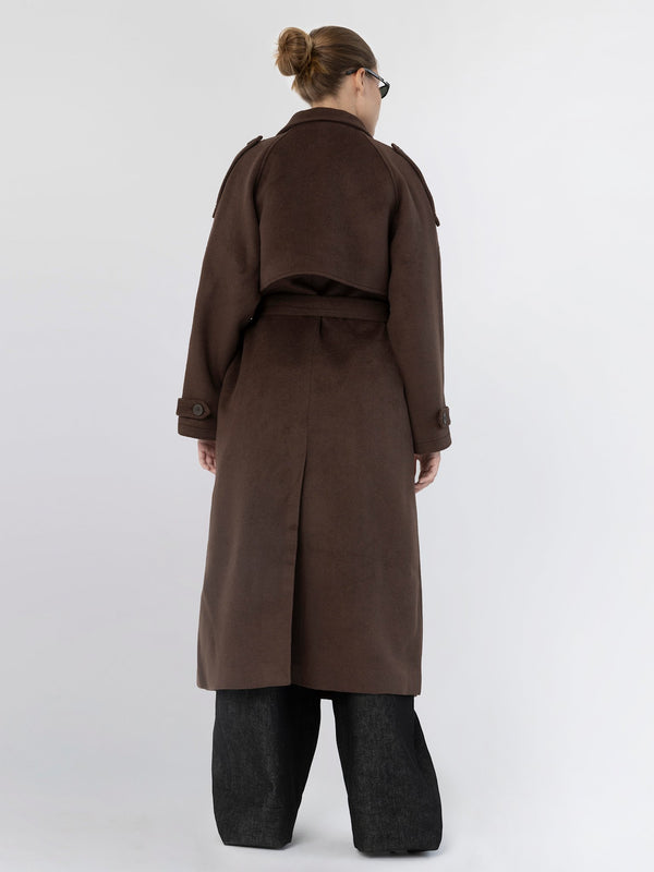 Stylish brown trench coat with a cropped design and long sleeves, paired with wide-leg pants, showcasing MEOTINE's modern aesthetic.