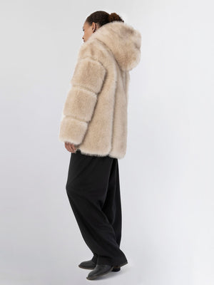 Cozy beige faux fur jacket with a hood, featuring a relaxed fit and stylish design, perfect for winter outings by MEOTINE.