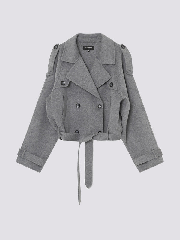 Stylish gray cropped trench coat with double-breasted buttons and a belted waist, perfect for a chic look by MEOTINE.