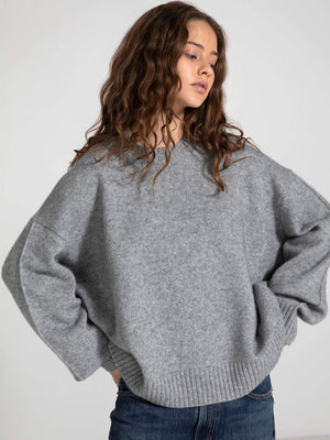 Cozy gray oversized sweater from MEOTINE, featuring a relaxed fit and ribbed hem, perfect for a stylish, comfortable look.