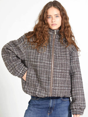 Cozy, oversized jacket in a textured gray pattern, featuring a high collar and zip closure, perfect for casual wear by MEOTINE.