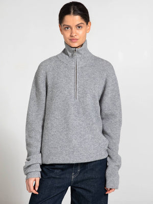 Cozy gray zip-up sweater with a high collar, featuring a relaxed fit and long sleeves, perfect for casual wear by MEOTINE.