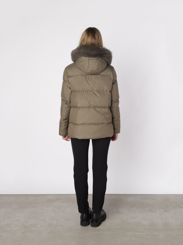 Stylish MEOTINE puffer jacket in olive green with a luxurious fur-lined hood, perfect for cold weather. Back view showcased.