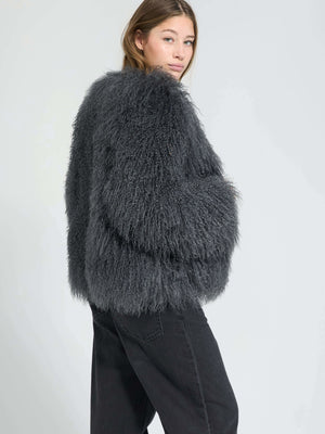 Cozy gray fluffy sweater with oversized sleeves, perfect for a stylish winter look. Designed by MEOTINE for comfort and warmth.