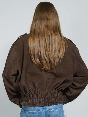 Brown cropped jacket with a cinched waist, featuring a relaxed fit and soft texture, perfect for a stylish, casual look by MEOTINE.