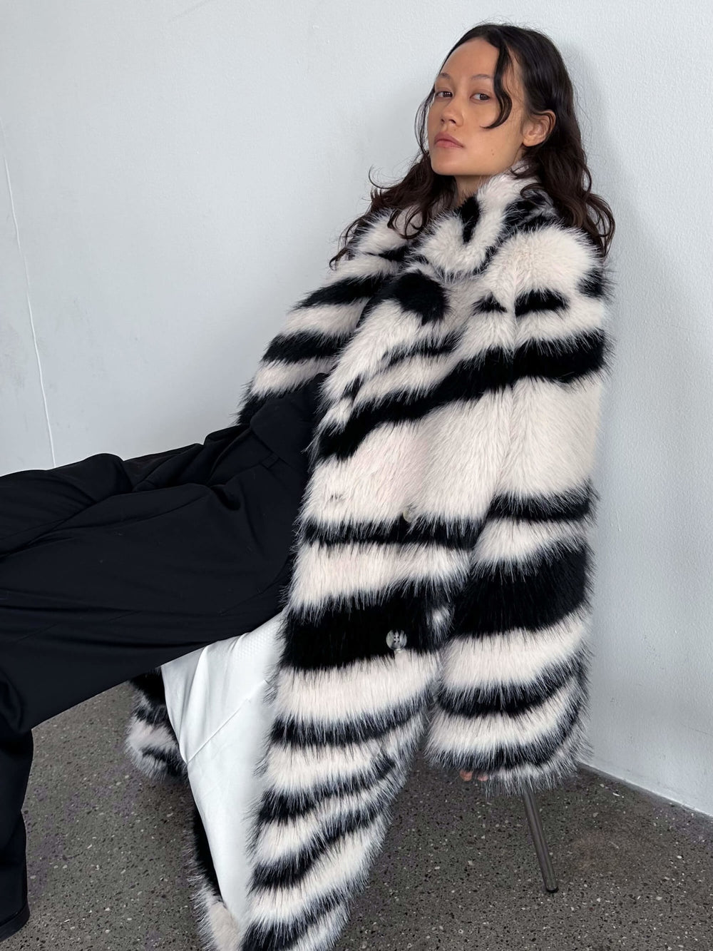 Stylish black and white striped faux fur coat by MEOTINE, featuring a relaxed fit and oversized silhouette, perfect for winter.