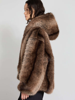 Luxurious brown faux fur coat with a hood, featuring a relaxed fit and soft texture, perfect for stylish winter wear by MEOTINE.