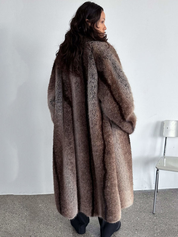 Luxurious MEOTINE faux fur coat in a rich brown hue, featuring a cozy oversized fit, perfect for stylish winter warmth.