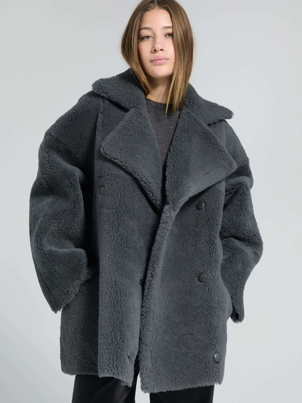 Cozy oversized gray coat with a plush texture and large lapels, perfect for stylish warmth this season by MEOTINE.