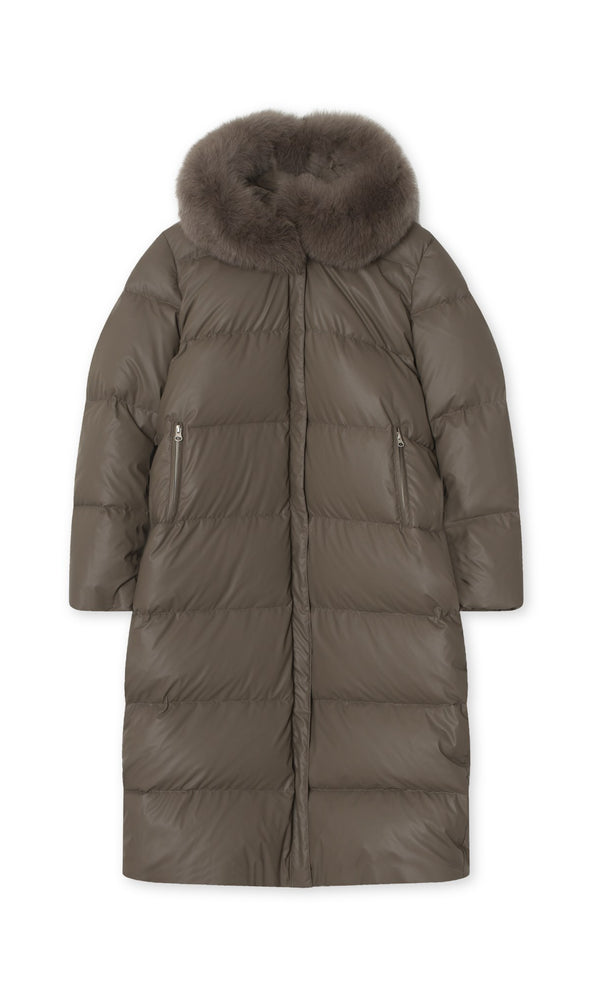 Stylish MEOTINE long puffer coat in olive green with a luxurious fur collar and zippered side pockets, perfect for winter warmth.