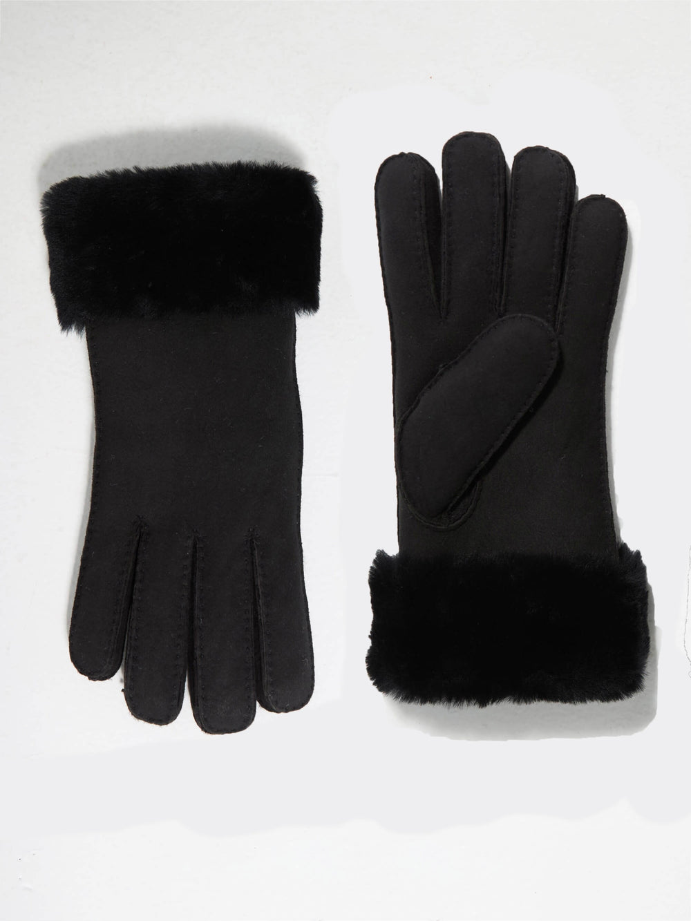 Stylish black gloves with a soft fur cuff, perfect for winter, featuring a sleek design by MEOTINE.