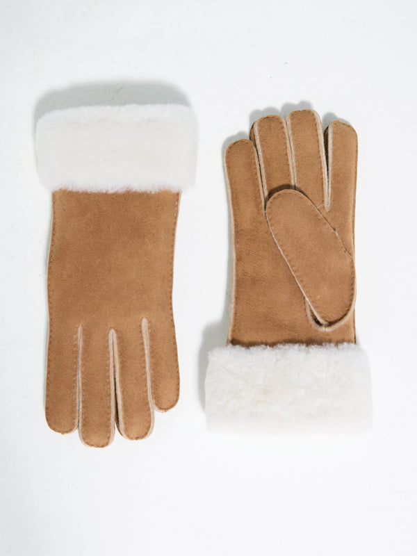 Soft brown gloves with a plush white fur cuff, perfect for winter warmth. Ideal accessory from MEOTINE for chilly days.