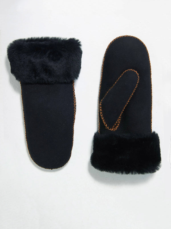 Black mittens with a soft faux fur cuff and stitching detail, perfect for warmth and style. Ideal for winter wear by MEOTINE.
