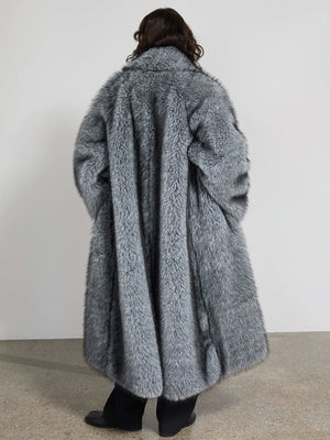 Luxurious gray faux fur coat by MEOTINE, featuring a voluminous silhouette and soft texture, perfect for stylish winter warmth.