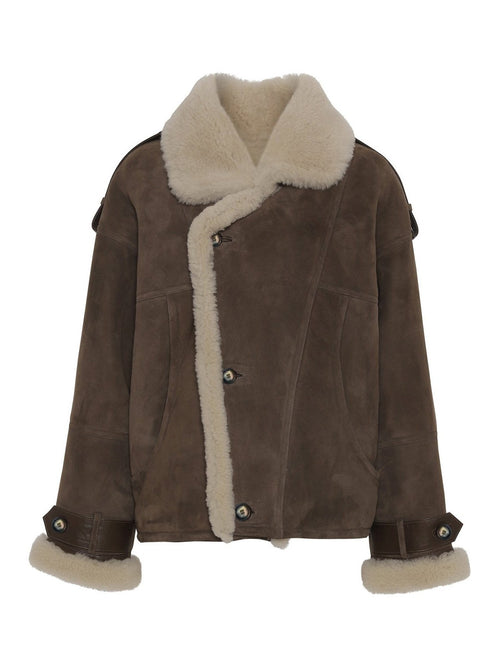 Brown shearling jacket with a cozy cream collar and cuffs, featuring a stylish button closure. Perfect for winter warmth by MEOTINE.